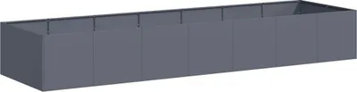 A long, rectangular planter box made of dark gray metal, viewed from a slightly elevated side angle.