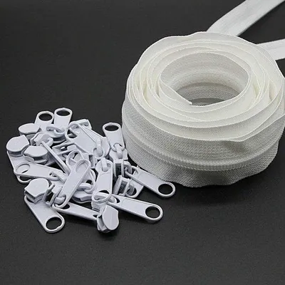 Immagine prodotto di Cerniera in nylon bianco da 9 m con 25 cursori per lavori manuali