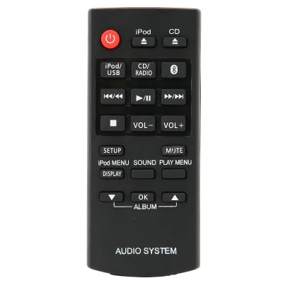 A black remote control for an audio system is shown against a white background.