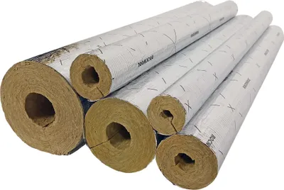 Several pieces of pipe insulation are arranged diagonally on a white background.