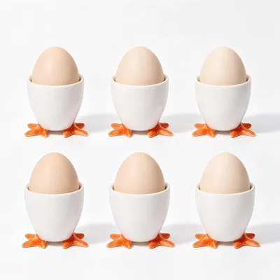 Imagen del producto de Juego de 6 recipientes para huevos de porcelana con diseños atractivos