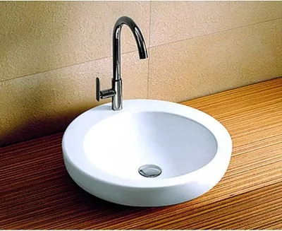 Immagine prodotto di Lavabo rotondo in Vetroceramica 46x46x14 cm KARAG