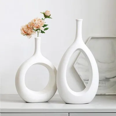 Produktbild von Unyqoos® Keramikvase Weiß 2er-Set – runde Hohl-Vasen (30 x 15 cm & 23,5 x 16 cm), Öffnung 2 cm, Donut-Design für Pampasgras, Blumen & Boho Tischdeko
