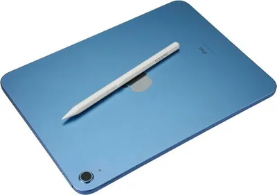 A blue iPad with a white stylus on top, shown from a slightly elevated angle.