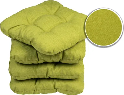 A stack of four green seat cushions.