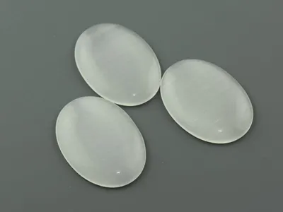 Produktbild von Vintageparts Cabochon Cateye Glas weiß 25 x 18 mm, 2 Stück