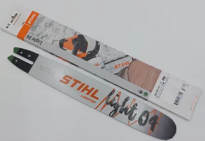 A STIHL chainsaw guide bar and its packaging are laid out on a white background.