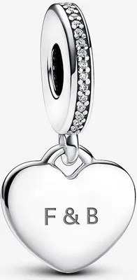 A silver heart-shaped charm with the letters "F & B" engraved on it, hanging from a bail encrusted with small clear stones.