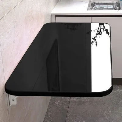 Imagen del producto de Mesa abatible de madera para montaje en pared, ideal para espacios pequeños