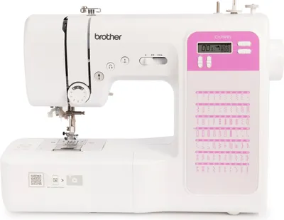 A white Brother sewing machine with pink accents is shown against a white background.