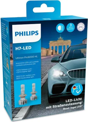 A product box for Philips H7-LED automotive lights, featuring an image of a car with its headlights on.