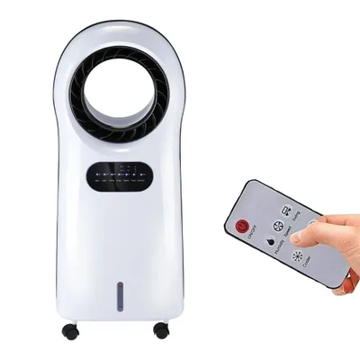 A white air cooler with a remote control held by a hand, against a white background.