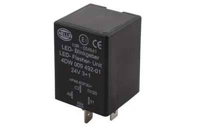 A black electronic relay unit with markings and pins.