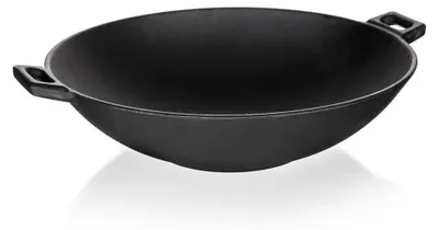 A black cast iron wok pan is shown from a side angle on a white background.