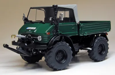 Produktbild von Unimog 406 (U84) Moosgrün mit Klappverdeck-Fahrerhaus Modell von Weise-Toys 1:32