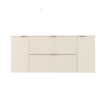 A front view of a cream-colored vanity cabinet with fluted doors and drawers.