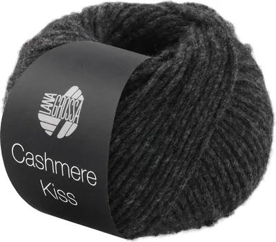 A ball of dark gray yarn with a black label wrapped around it.