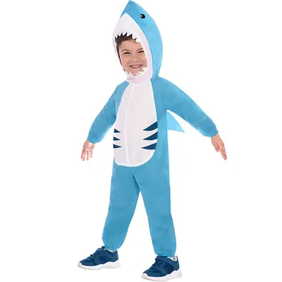 A child wearing a shark costume.