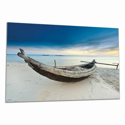 Produktbild von Wallario Herdabdeckplatte aus Glas, Größe 80 x 52 cm 1-teilig, Motiv Fischerboot am Strand mit Sonnenuntergang