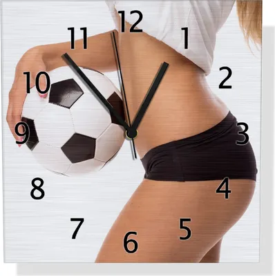 Produktbild von Wallario Design Wanduhr Fußball - sexy Frau mit einem Fußball aus Aluverbund, Größe 30 x 30 cm