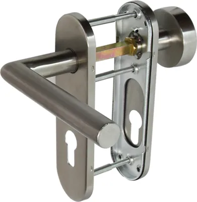 A close-up view of a stainless steel door handle set, showing its internal mechanism and keyhole.