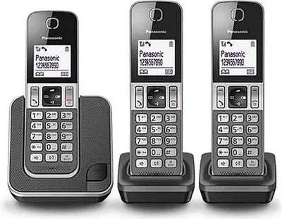 Three Panasonic cordless phones are displayed on their charging bases against a white background.