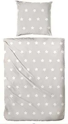 A pillowcase and duvet cover with a star pattern, laid out flat against a white background.