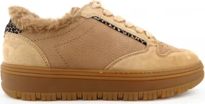 A side view of a single tan sneaker with fur trim.
