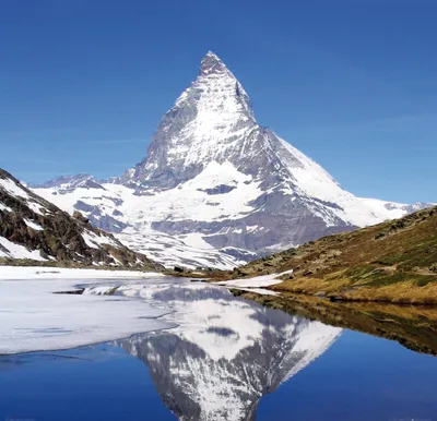 Zdjęcie produktu dla Obraz z nadrukiem gór - Matterhorn z Riffelsee (100 x 100 cm)