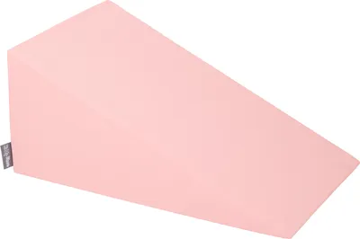 A pink foam wedge on a white background.