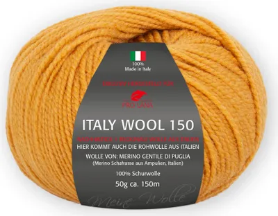 A ball of gold-colored yarn with a label wrapped around it.