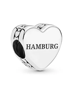 A silver heart-shaped charm with the word "HAMBURG" engraved on it, set against a white background.