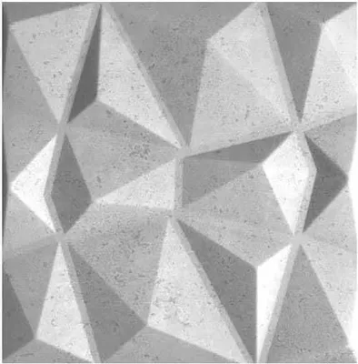 A close-up, textured view of a gray geometric wall panel.