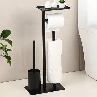 Produktbild von Stijlvolle vrijstaande toiletrolhouder met geïntegreerde borstel en opbergruimte