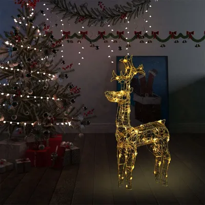 A decorated Christmas tree and presents are in the background, with a lit reindeer decoration in the foreground.