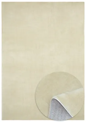 A beige rug is shown from a top-down perspective, with a close-up inset showing the texture and underside of the rug.