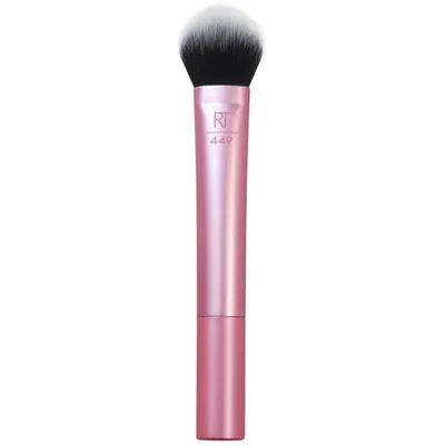 A makeup brush with a pink handle and black and white bristles, isolated on a white background.