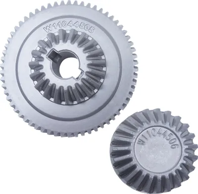 Two metal gears are shown against a white background. One gear is larger and has a central opening with internal teeth. The smaller gear is positioned to the right and slightly below the larger gear.