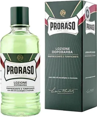A bottle of Proraso aftershave lotion and its packaging are displayed side-by-side against a white background.