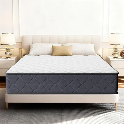 A mattress on a bed frame in a bedroom setting.