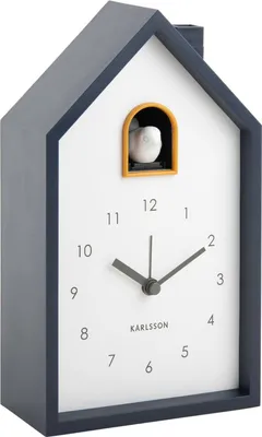 A cuckoo clock alarm clock with a dark blue house-shaped frame and a white face.