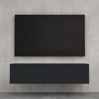 A black TV mounted on a gray concrete wall above a black TV stand.