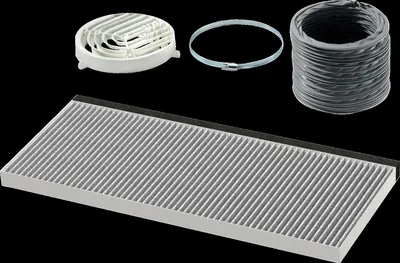 A collection of kitchen appliance accessories, including a filter, a clamp, and a ventilation hose, laid out on a black background.