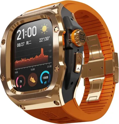A close-up, angled view of a gold and black smartwatch with an orange silicone band.