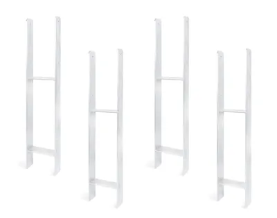 Four H-shaped metal posts on a white background.