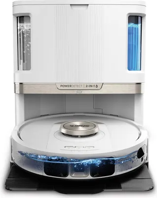 A white robot vacuum cleaner with a docking station, showing water in the cleaning tank.