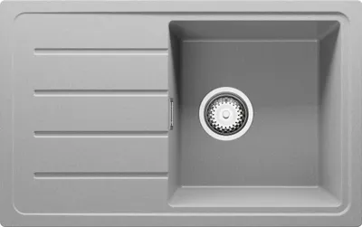 A top-down view of a gray granite kitchen sink with a single basin and a drain set.