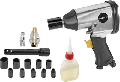 A set of pneumatic tools and accessories laid out on a white background.