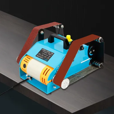 Image de Machine ponceuse à bande électrique de 950W, avec double table de travail et vitesse variable, idéale pour les travaux de ponçage