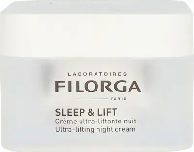 A close-up shot of a white jar of Filorga Sleep & Lift Ultra Lifting Night Cream.